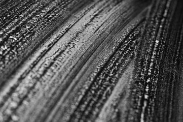 Close-up view of textured surface showcasing intricate patterns in monochrome tones