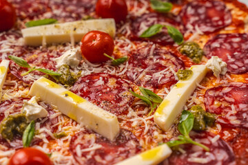 Pizza textured background. Pepperoni Pizza Close-Up. High quality photo