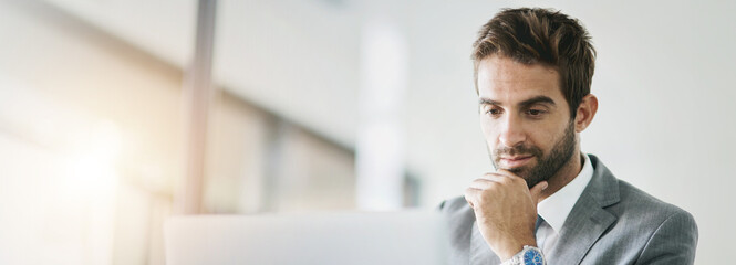 Thinking, laptop and business man in office for research project, online website and finance...