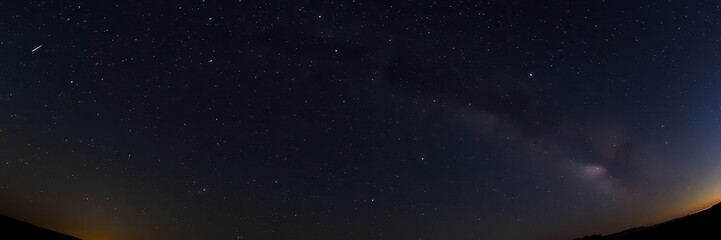 Fototapeta premium Photo of a mesmerizing starry night sky filled with countless twinkling stars, stars, nightfall, galaxy