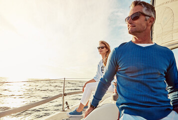 Smile, love and travel with mature couple on yacht together with celebration, anniversary and...