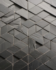 Obraz premium Black geometric stone wall with triangular patterns. Origami style geometric textured pattern wallpaper background with intricate ornate details.