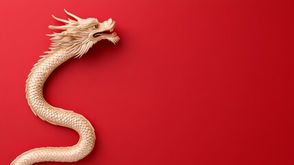 Obraz premium A detailed golden statue of a Chinese New Year dragon, its body coiled and scales glimmering under warm lighting