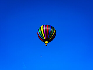 Colorful Hot Air Balloon Floating in the Clear Blue Sky