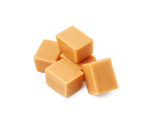 Tasty sweet caramel candies isolated on white