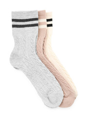 Different soft socks isolated on white, top view