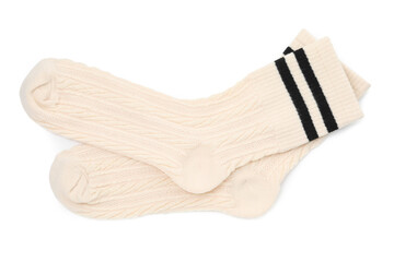 Pair of soft socks isolated on white, top view