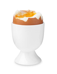 Soft boiled egg in eggcup isolated on white