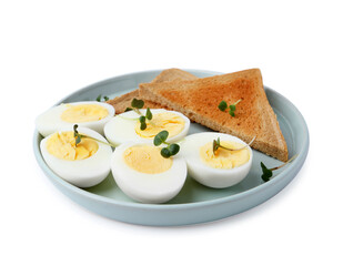 Halves of hard boiled eggs and bread isolated on white