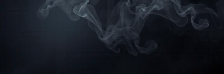 Obraz premium Abstract swirls of smoke billowing on a black background, mysterious, effect, background