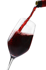 Pouring red wine into glass isolated on white