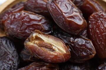 Many tasty dried dates as background, closeup