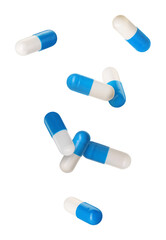 Antibiotic pills in air on white background