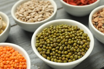 Superfood. Different healthy food products on grey table, closeup