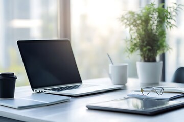 Fototapeta premium Modern Workspace with Laptop and Tablet. Concept of Productivity, Efficiency, and Digital Work.