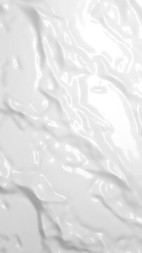 Animated waves on a white surface in a seamless loopable 3d video. Shiny white surface deformed with a generated waves or noise.