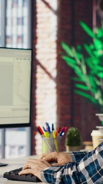 Software developer at computer coding, creating software, implementing algorithms. IT expert in home office working with code editor, building applications, optimizing performance, camera B