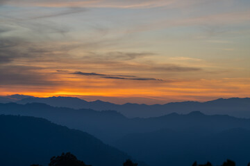 Obraz premium sunset with colorful sky and mountain in the evening is very beautiful landscape view 