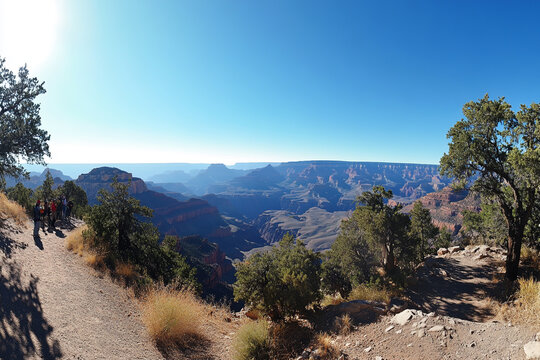 A panoramic view of the Grand Canyon, under a clear blue sky