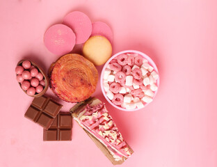 set of sweets on a pink background