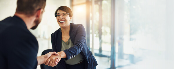 Business, partnership or handshake in office with agreement for investment deal, funding success or opportunity. Financial investor, people or collaboration for contract negotiation with banner space