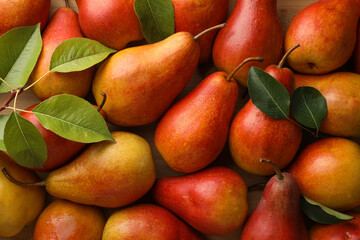 Fresh ripe juicy pears as background, closeup