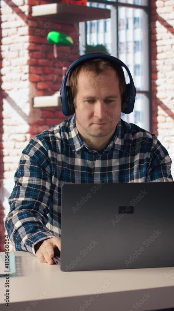 Aufkleber teleworker enjoying music while researching data for company project, doing tasks in personal home o