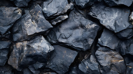 A dark stone background with a textured surface.