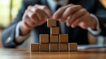 Businessman constructing digital blocks to symbolize growth and business development strategy