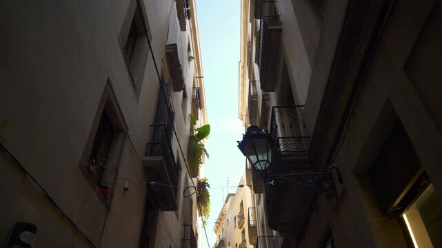 day time barcelona city famous old town walking street slow motion pov up view panorama 4k spain
