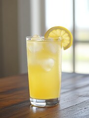 A refreshing glass of lemonade with ice and a lemon slice, perfect for a warm day.
