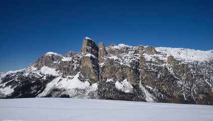 Panoramic view of the majestic Dolomite landscape snow-capped Sella group. Ideal destination for ski enthusiasts from all over the world