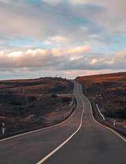 beautiful mountain road at sunset