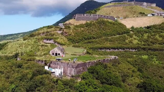 Aerial flyover of Brimstone Fortress, the ruins of a British fort and Unesco World Heritage Site on the Island of St Kitts.