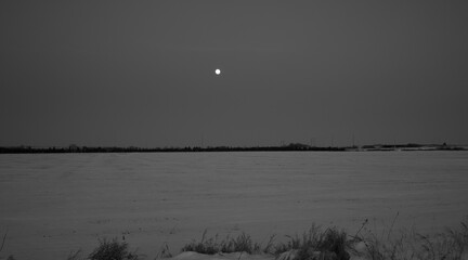 The full moon over a farmers field