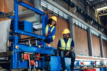 Foreman or worker work at factory site check up machine or products in site.