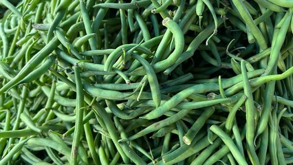 Fresh and raw vegetables the market. Fresh potatoes, bel peppers, tomatoes, zucchini, eggplant and green beans for sale at vegetable market, close up. Organic vegetables at local market.	