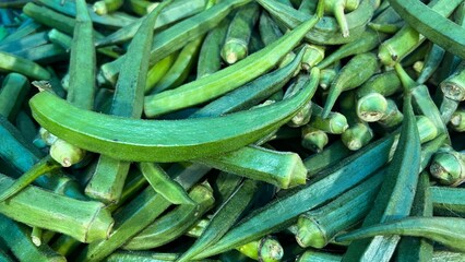 Fresh and raw vegetables the market. Fresh potatoes, bel peppers, tomatoes, zucchini, eggplant and green beans for sale at vegetable market, close up. Organic vegetables at local market.	