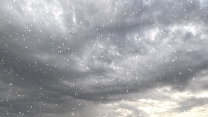 beautiful fall of snow on clouds on sky backdrop - photo of nature