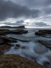 Rocky shore of Avalon Beach in cloudy morning, Sydney, Australia.