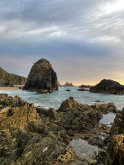 Cloudy morning view of Bermagui coastline.