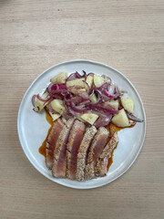 Seared tuna steak and roast vegetables.