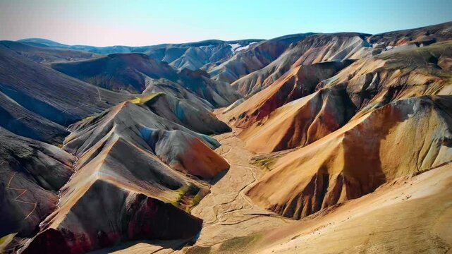 Landmannalaugar Highlands Summer in Iceland. Aerial Drone shoot over rainbow mountains valley  on sunny day. Laugavegur trail, volcanic landscape.