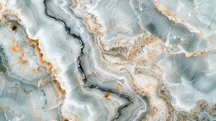 A close-up of a light grey, brown, and white marble texture.