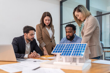 multiracial business people having discussion in the office room,real estate home project teamwork meeting with blueprint,documents and home model