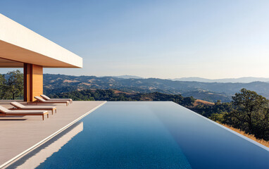 Fototapeta premium Modern infinity pool overlooks scenic hills in the countryside during a clear day