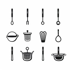 Fototapeta premium A set of black and white kitchen utensils on white background. The utensile set includes a slotted spoon, fork, ladle, serving spoon, two strainers, whisk, slotted turner, tea infuser, and colander.