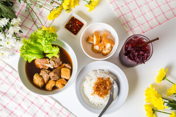 Meal set of braised pork soup with rice and roselle juice on the wood table#5