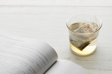 glass of hot tea and tea bag