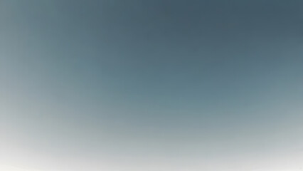 A minimalist abstract background with a soft, gradient transition from dark to light blue.